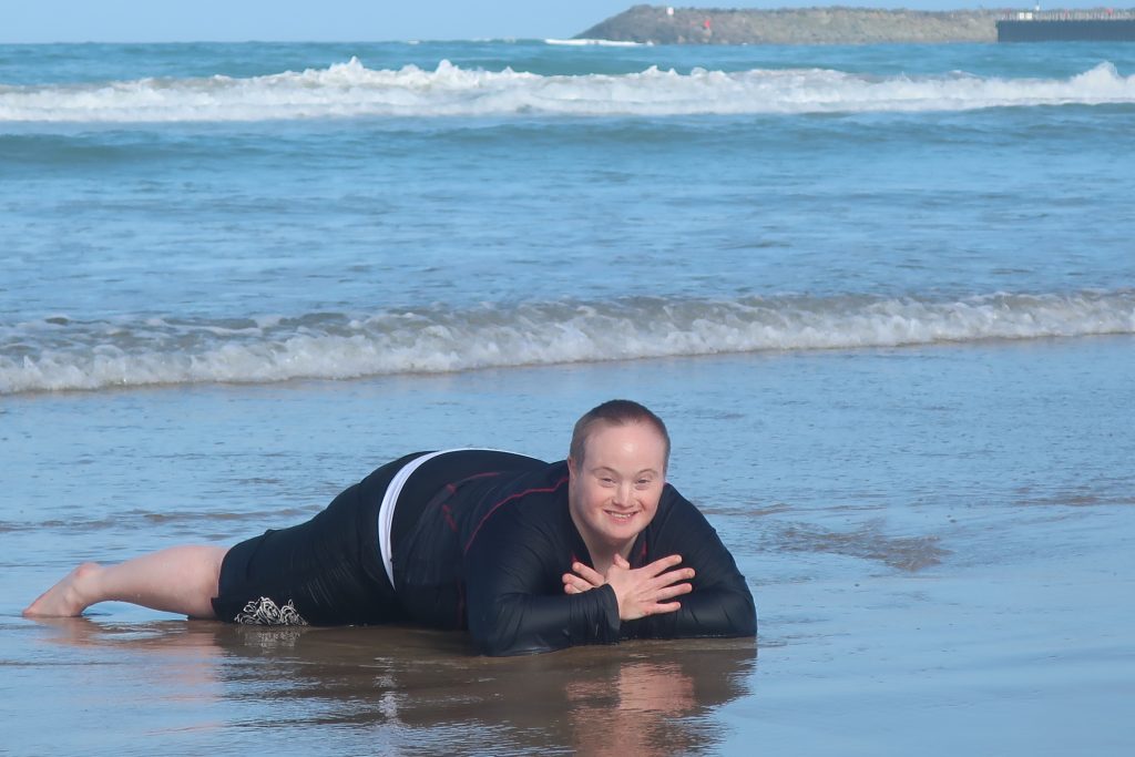 Enjoying the beach at Anglesea while on respite care with Leisure Options.